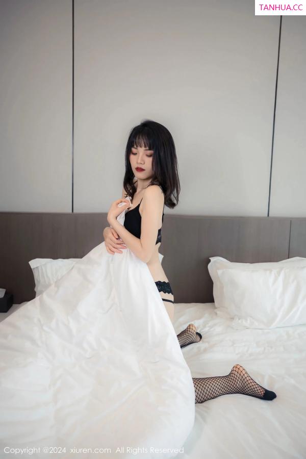   [XiuRen]高清写真图 2024.04.01 No.8320 唐安诺 黑丝美腿第9张图片